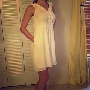 White mini dress with pockets